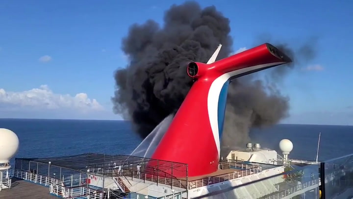 Cruise ship catches fire while docked in Grand Turk