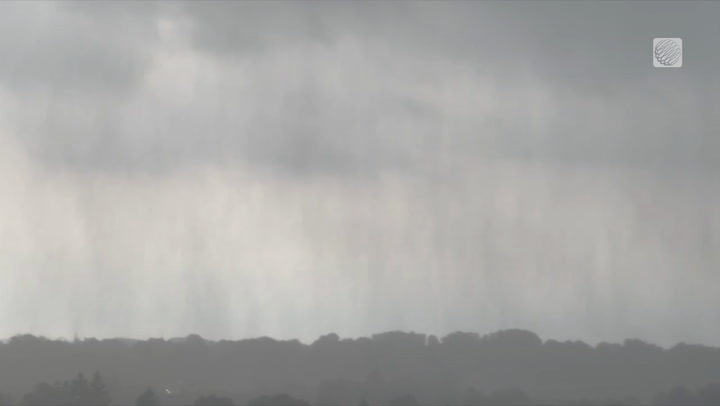CURTAINS OF RAIN BLOW ACROSS PARTS OF SOUTHERN ONTARIO