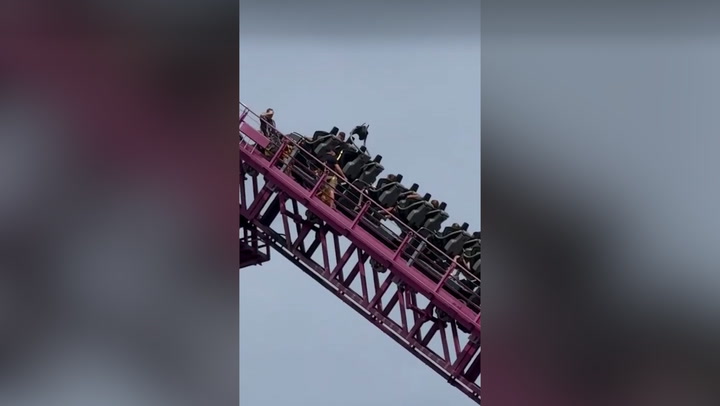 Riders trapped on one of world's tallest rollercoasters after scarf gets stuck in wheel