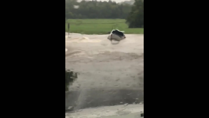 Truck gets stuck in floodwaters after heavy rainfall in Tennesse