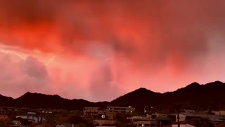 Stunning red sunset captured above Arizona hills
