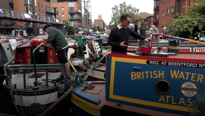 Narrowboaters gather in Birmingham for canal funding protest