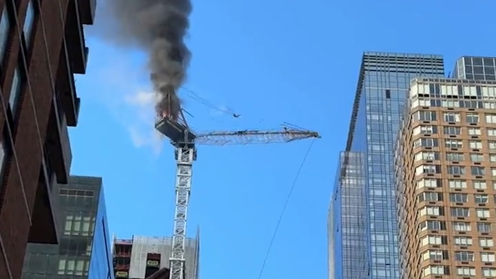 Moment crane collapses in middle of Manhattan after catching fire