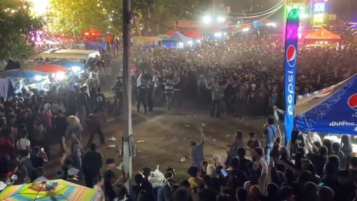 Spectators scatter as brawl erupts at concert in Thailand