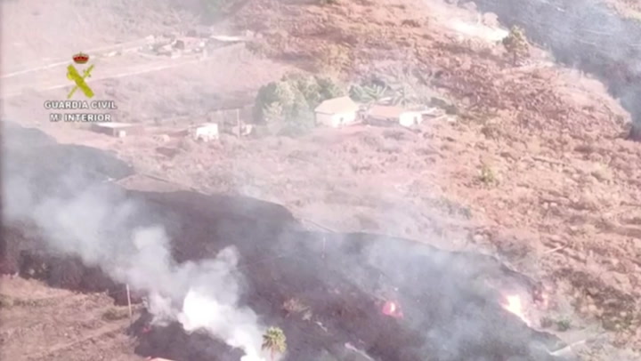 Spanish Civil Guard flies over erupting volcano