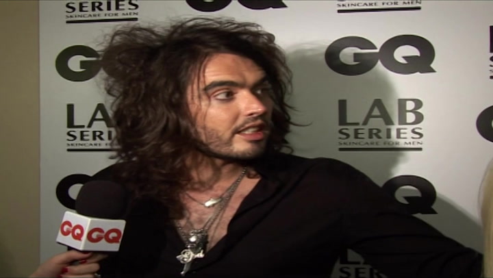Russell Brand takes part in awkward interview following row with Rod Stewart at GQ awards