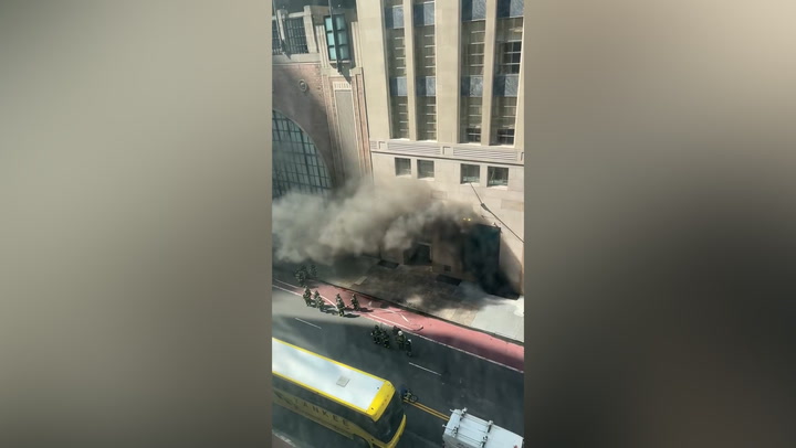 Thick plumes of smoke from fire at Tiffany's on 5th avenue