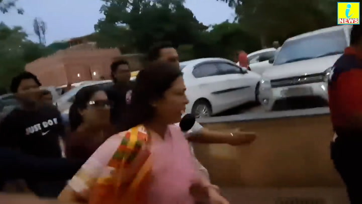Indian minister runs away from reporters as she is confronted over wrestlers protest