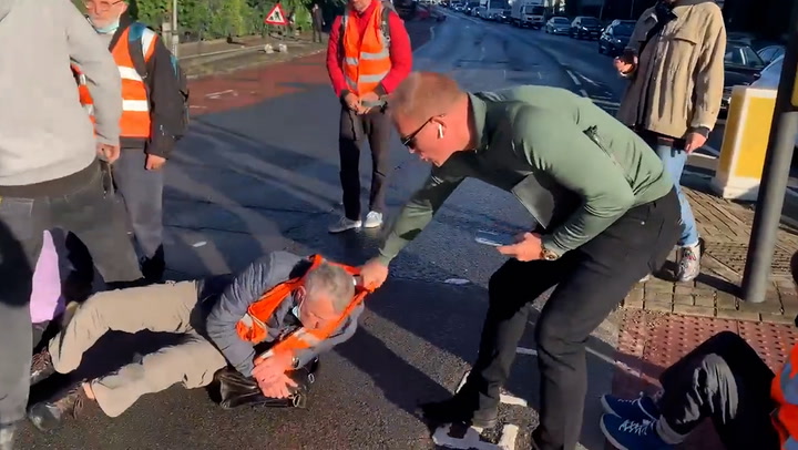 ‘I’ve got a f****** job to do’: Drivers clash with Insulate Britain protesters