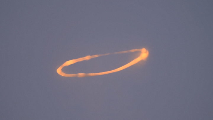 Mount Etna blows rare smoke rings into sky