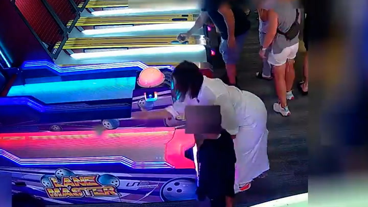 Female arcade player 'throws skee ball' at child's head in New Jersey