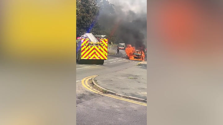 Fire engulfs 'hybrid' car within seconds of starting