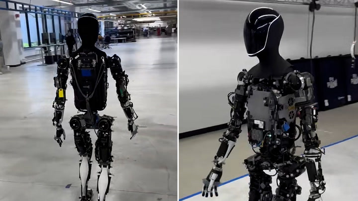 Elon Musk takes 'spooky' humanoid robot out for walk round factory