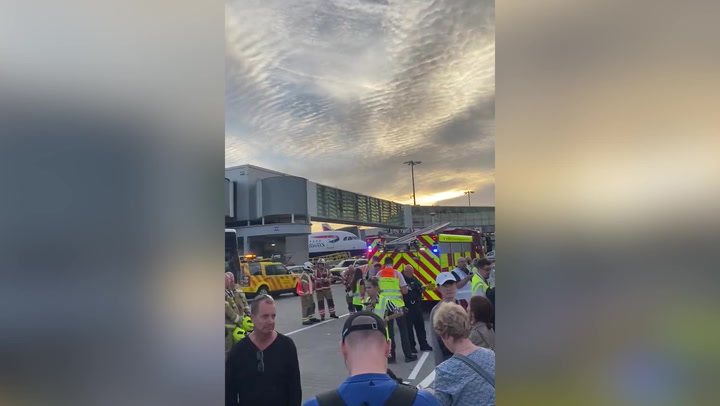 BA plane passengers evacuated at Heathrow after four fell ill from unknown 'fumes'