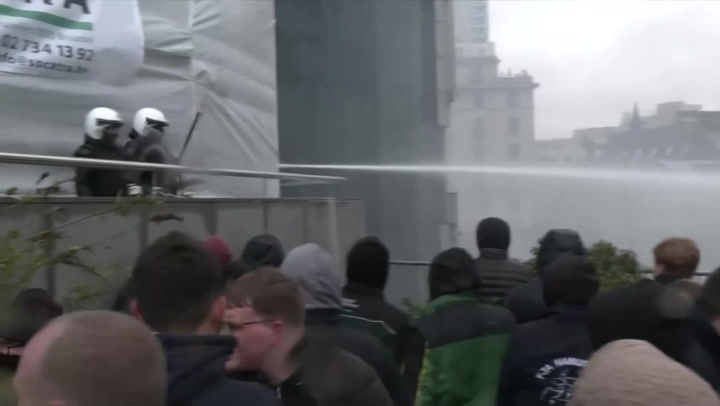 Water cannon fired as police clash with protesting farmers in Brussels