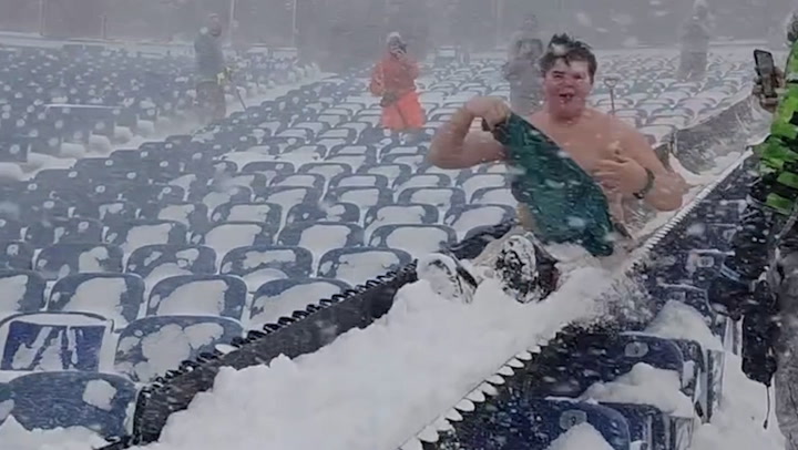 Buffalo Bills fans help shovel snow out of stadium ahead of rearranged playoff game