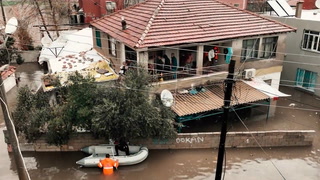 Residents rescued by boats as raging floods wash away roads in Turkey