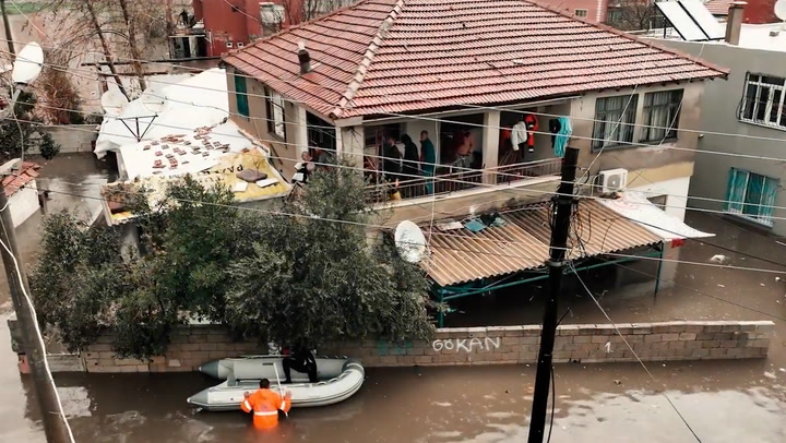 Residents rescued by dinghies as raging floods wash away roads in Turkey