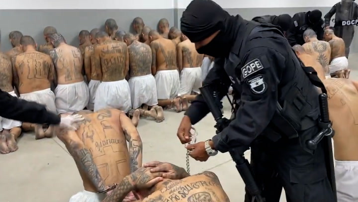 El Salvador moves suspected gang members to new 'mega prison' amid human rights criticism