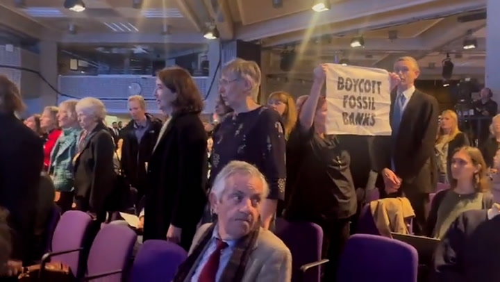 Singing Extinction Rebellion activists disrupt Barclays AGM meeting