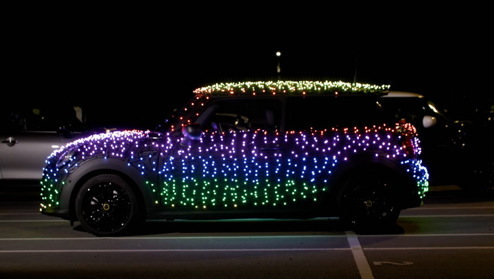 'Festive Mini' decorated in thousands of Christmas lights for charity