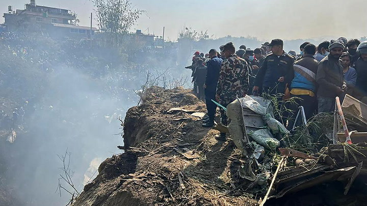 At least 60 dead after plane carrying 72 crashes in Nepal