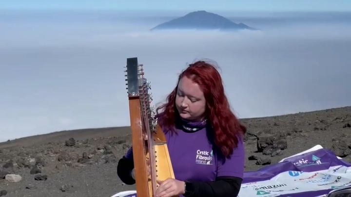 Harpist performs at Mount Kilimanjaro summit to complete Guinness World Record