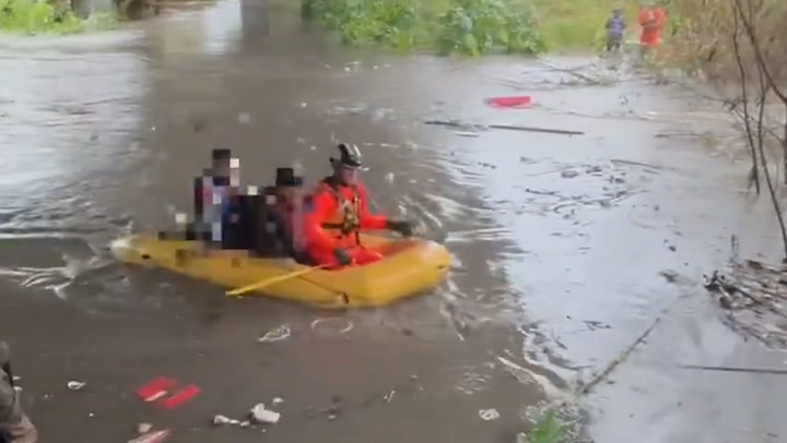 US border guards rescue undocumented migrants from flood then arrest them