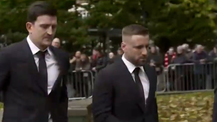 Manchester United players arrive at Bobby Charlton's funeral