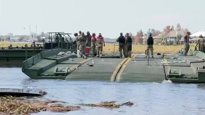 National Guard constructs temporary bridge to deliver aid to coastal regions of Louisiana