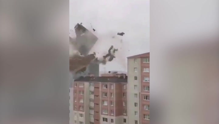 Istanbul: Debris fills sky when heavy winds pull roof off building
