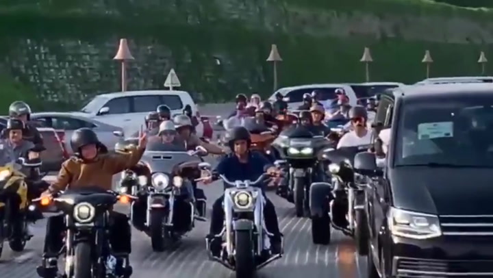 Brazil President Bolsonaro tours Qatar in bizarre motorbike group