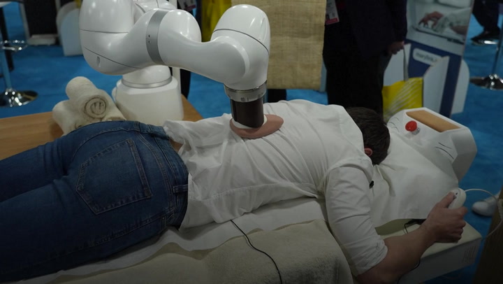 AI masseuse with robotic arm goes on display at CES tech show in Las Vegas