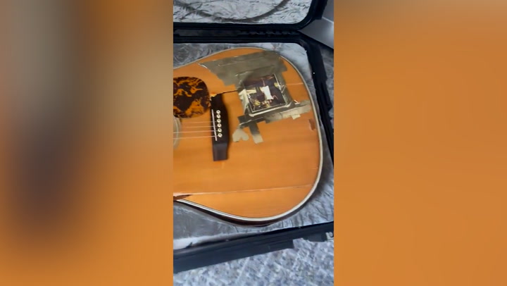 Airline damages singer's 20-year-old guitar during flight