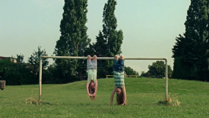 Dairylea ad banned over two girls eating while hanging upside down