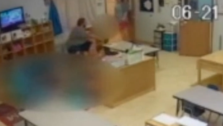 Daycare worker pushes child to ground in CCTV footage