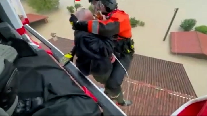 Emilia Romagna floods- Elderly residents airlifted from roof as water surrounds house.mp4