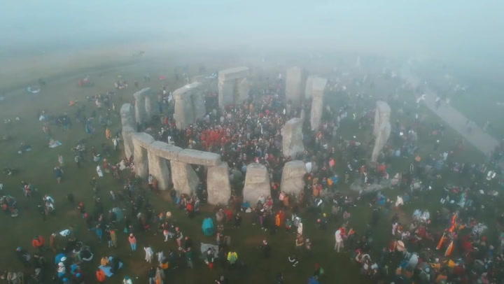 Crowds gather at Stonehenge for Summer Solstice