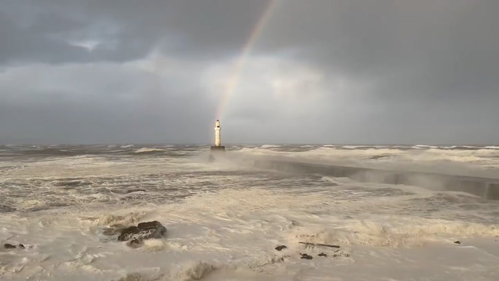 Rainbow glows over pier as Storm Babet hits Aberdeen coast