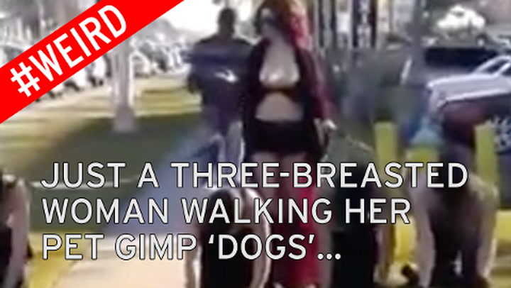 Triple-breasted woman is back! Jasmine Tridevil pictured walking