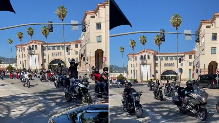 Stunt performers ride motorbikes through Hollywood in solidarity with strikes