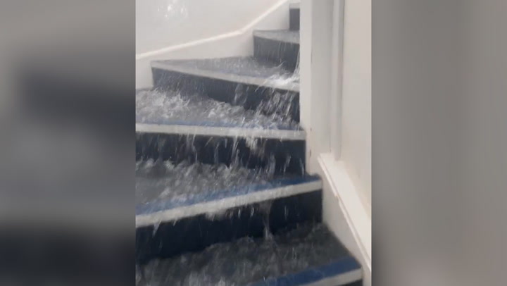 Major leak turns London flats into 'scene from Titanic' as water floods stairs