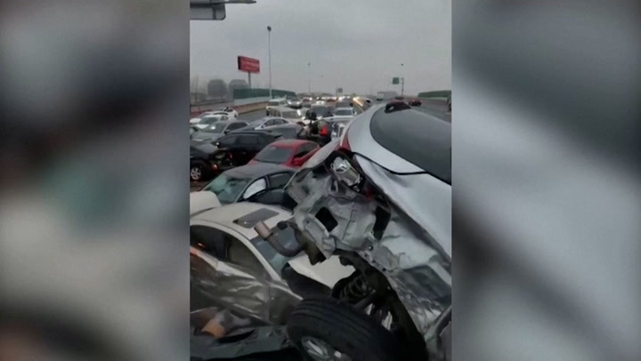 Several injured after 100-car pile up in icy China