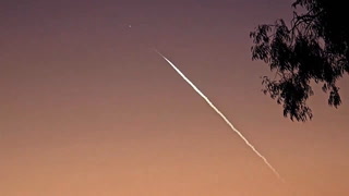 SpaceX Falcon 9 rocket streaks across sky after satellite launch