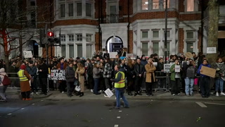 Crowds gather at Alexei Navalny vigil outside London’s Russian embassy