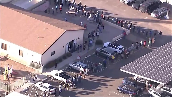 Aerial footage reveals long lines of voters in Phoenix as officials announce technical difficulties