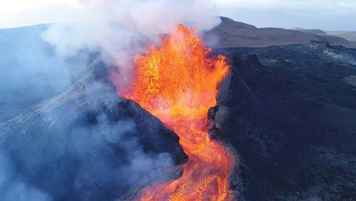 Iceland's Fagradalsfjall volcano erupts sending crater rim collapsing into lava pond