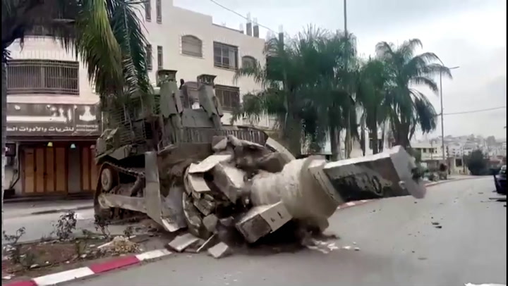 Israeli bulldozer destroys monument of former Palestinian Authority president