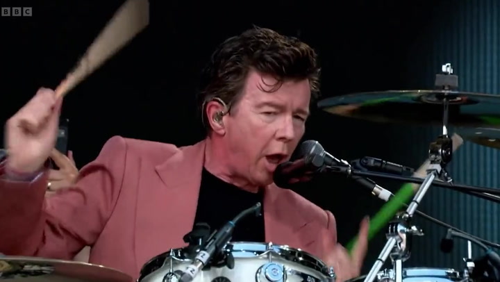 Rick Astley covers AC/DC's 'Highway to Hell' on drums during impressive Glastonbury set