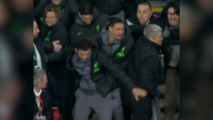 Darwin Nunez hurdles barrier in celebration as Liverpool win Carabao Cup